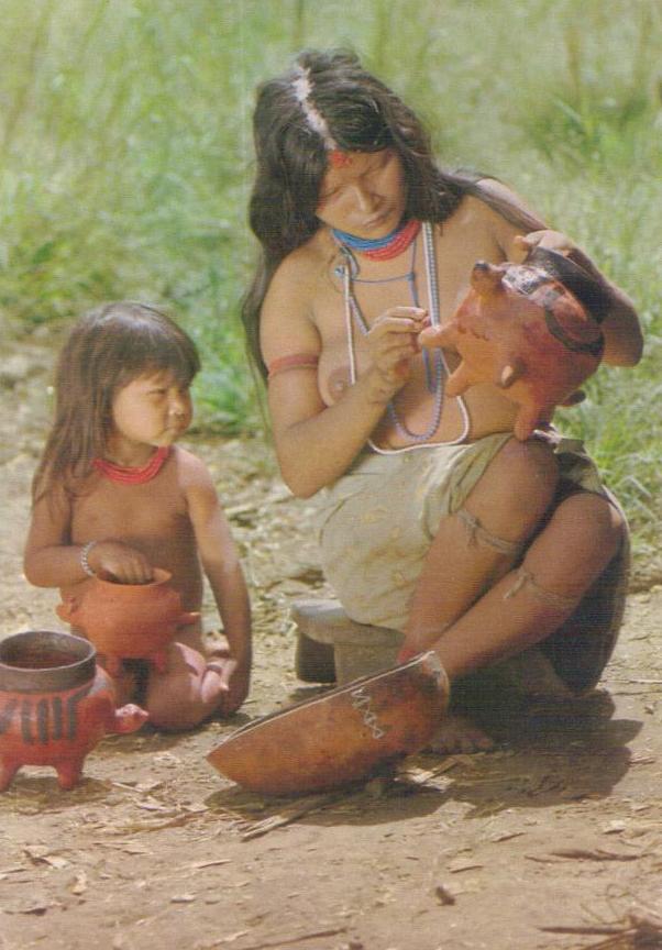 Juruna woman embellishing her clay-vases, Native reserve of Xingu