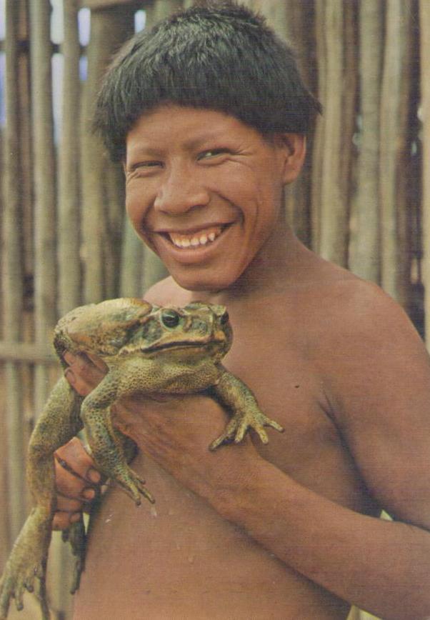 Xingu National Park, Koluene River, Tosseco – Kaiapalo indian with Amazonic Frog