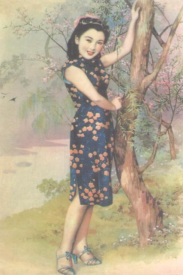 Woman next to tree