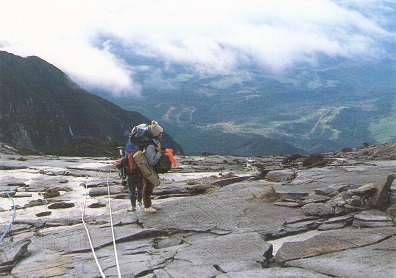 Mt. Kinabalu, Climber on summit plateau (13,000 ft.)