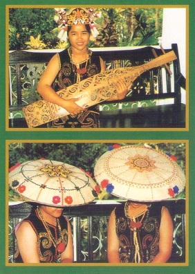 Sarawak, Kenyah women with Sape (lute) and shade hats