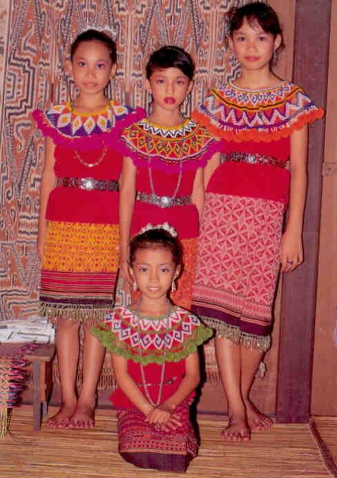 Iban girls in traditional costumes