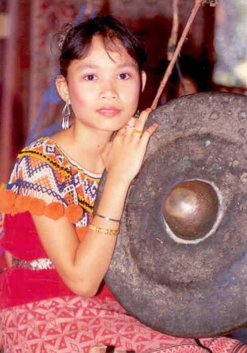 An Iban girl in traditional costume