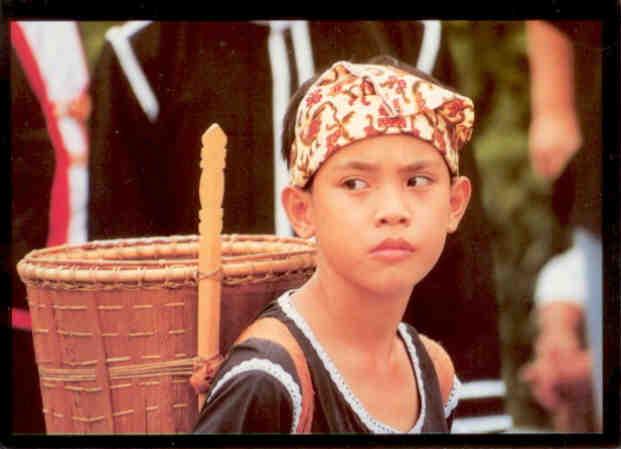 Sarawak, Young boy with rotan backpack at Gawai celebrations