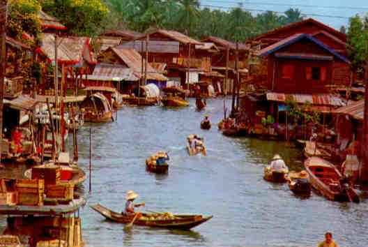 A VIEW of a group of VILLAGERS HOUSES near a Canal (sic)