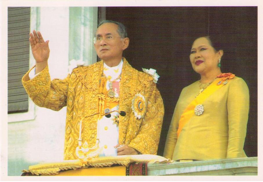 King Bhumibol, waving, and Queen Sirikit