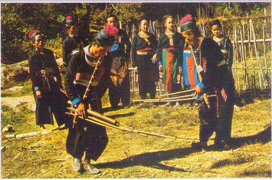 Thai.Meo Hill.Tribe men and women Playing music (sic)