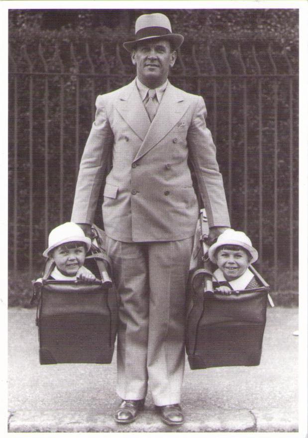 Man Carrying Twins