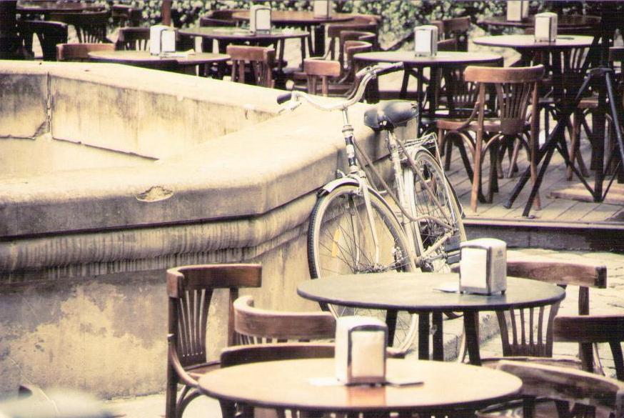 Lviv, outdoor cafe and bicycle (Ukraine)